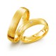Vielsesringe i guld med enkle diamanter i et smukt bånd, slebet i en smuk brilliantslibning.